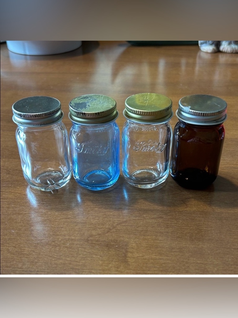 Set of Four Mini Glass Jars with Metal Lids